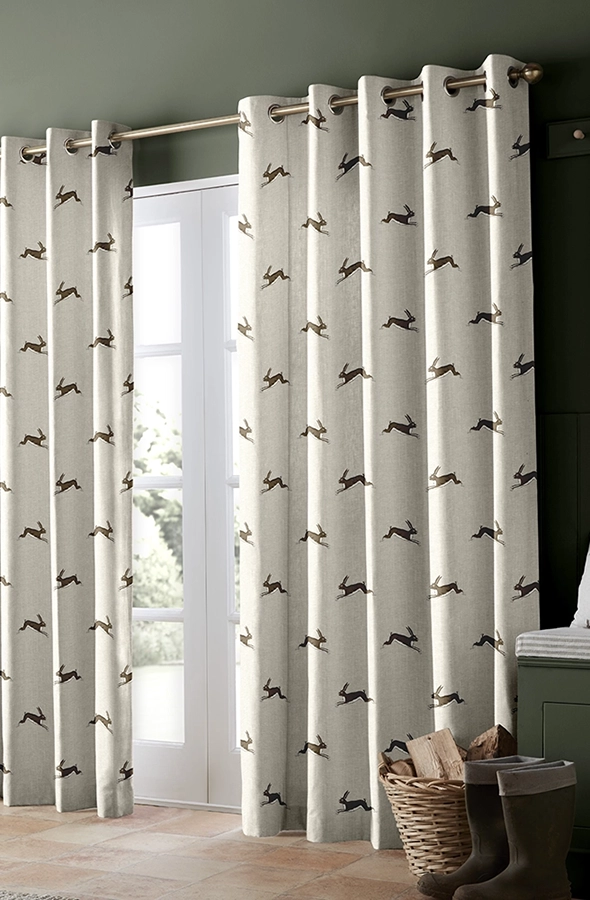 Room with white eyelet curtains from Emily Bond