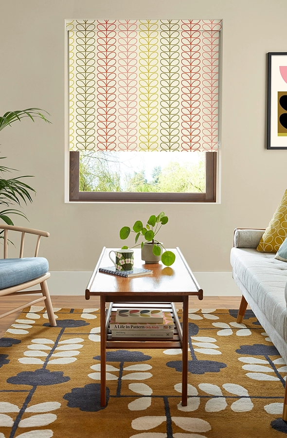 Room with colourful roller blind blind form Orla Kiely