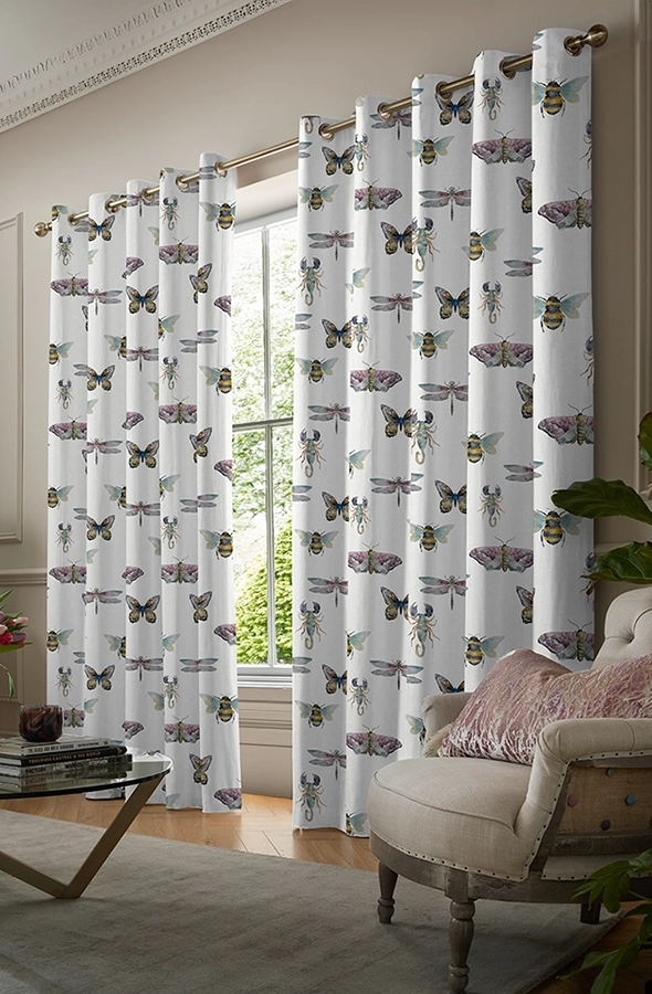 Room with butterfly design white curtains form Voyage Maison