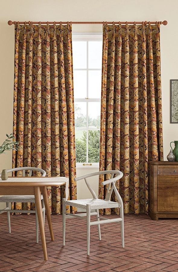 Room with green curtains in design inspired by William Morris at Home