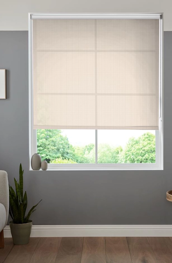 Room with cream roller blind from illumin8 Rollers Collection
