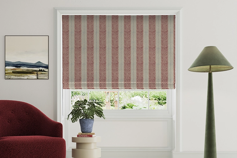 Room with red floral stripe roman blind from Land & Shore