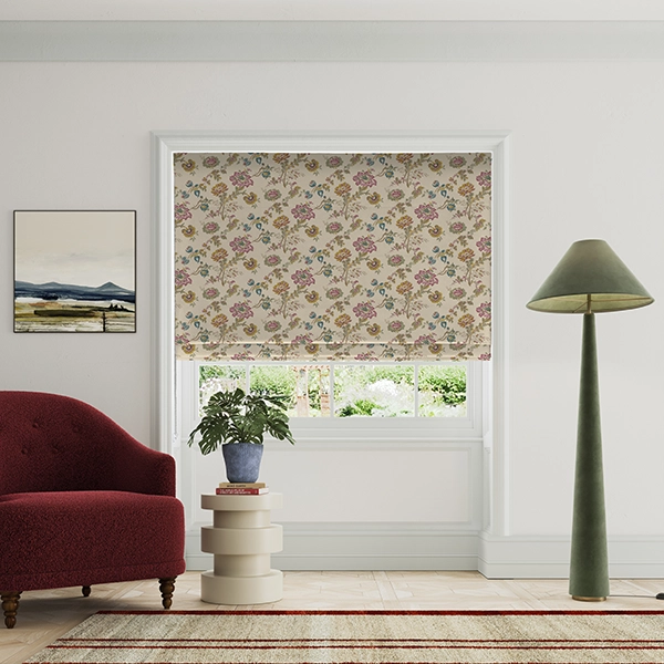 Room with warm floral design roman blind from Land & Shore
