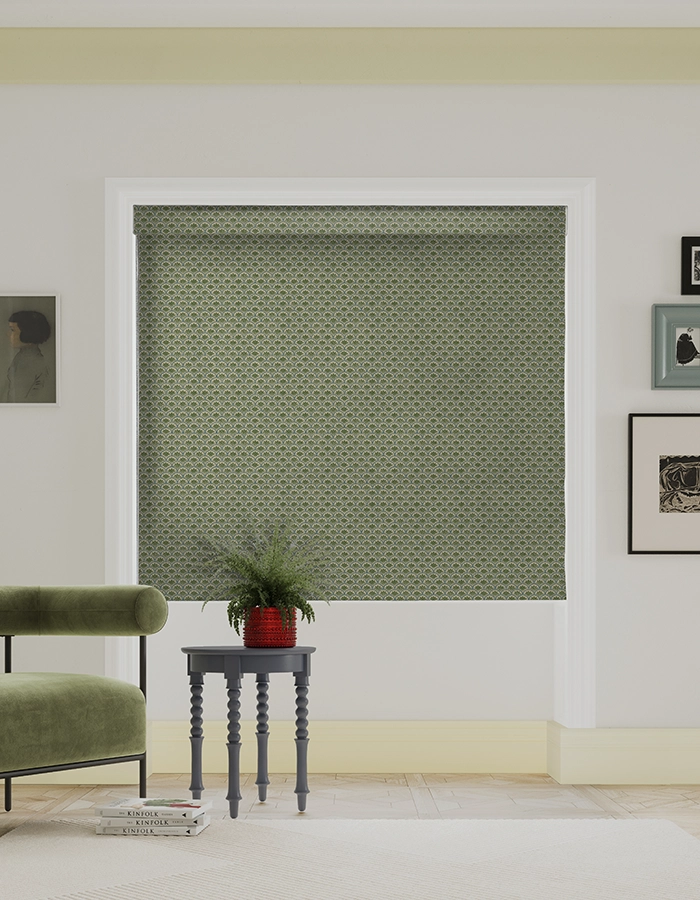 Room with green geometric roman blind from Land & Shore