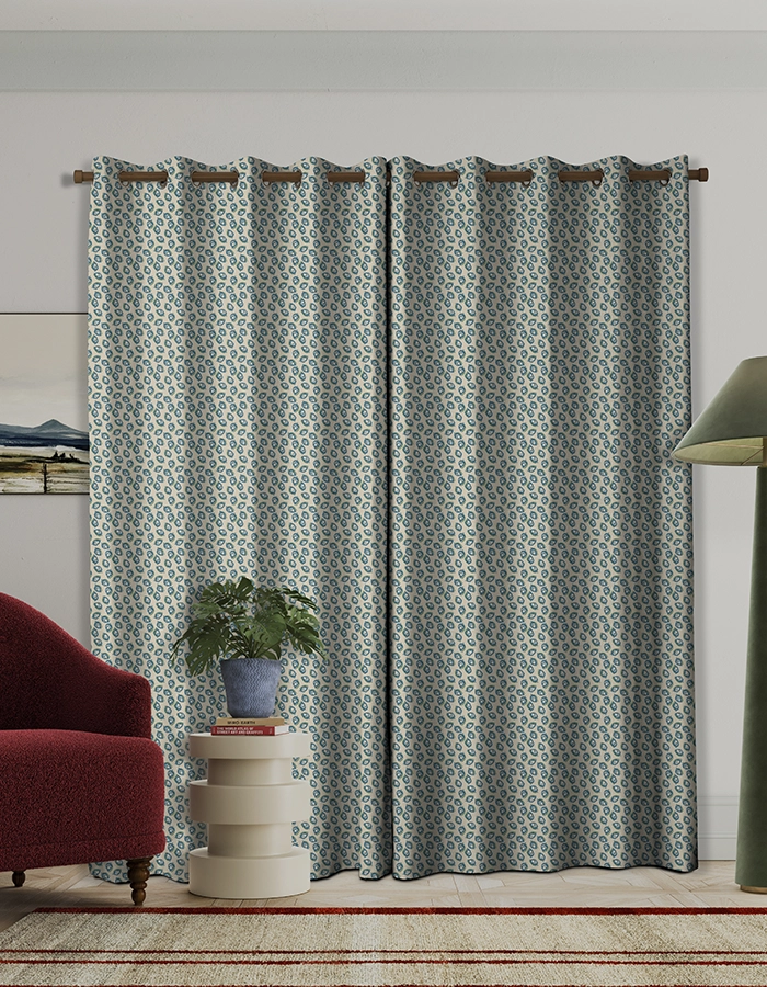 Room with geometric teal curtains from Land & Shore