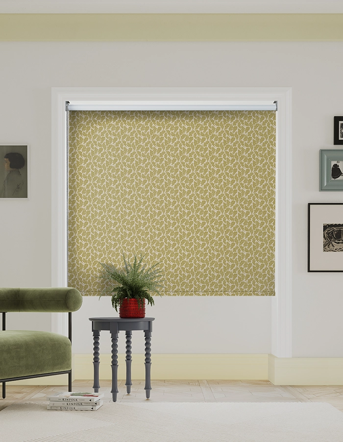 Room with yellow leaf design roller blind from Land & Shore