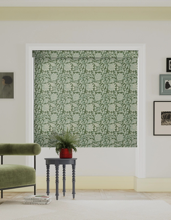 Room with green leaf roller blind from Land & Shore
