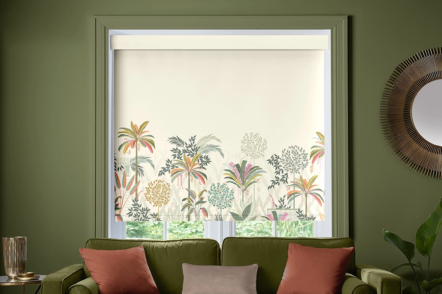 Room with green border floral design roller blind form Sara Miller